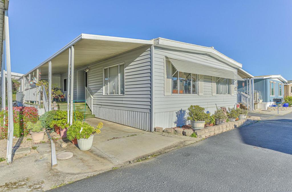 Very quaint 2 bedroom, 2 bath home, that also has a cute little sunroom off to the side nicely located in this 55+ park that has many imenitites to enjoy. Has a small lake to enjoy and take nice walks around, or you can enjoy some time in the recreation room with new friends. This particular unit is very close to the lake as well. The community amenities include a club house, tennis courts, pool, a small gym, a small lake, and very centrally located to shopping, dining, Highway 101 and more! Park approval is required prior to making offer and must be owner occupied. 55+ community, 2 adult maximum per unit, no children allowed. You own a share of the park with 150 others, the $30,600 ownership price is included in the purchase price.