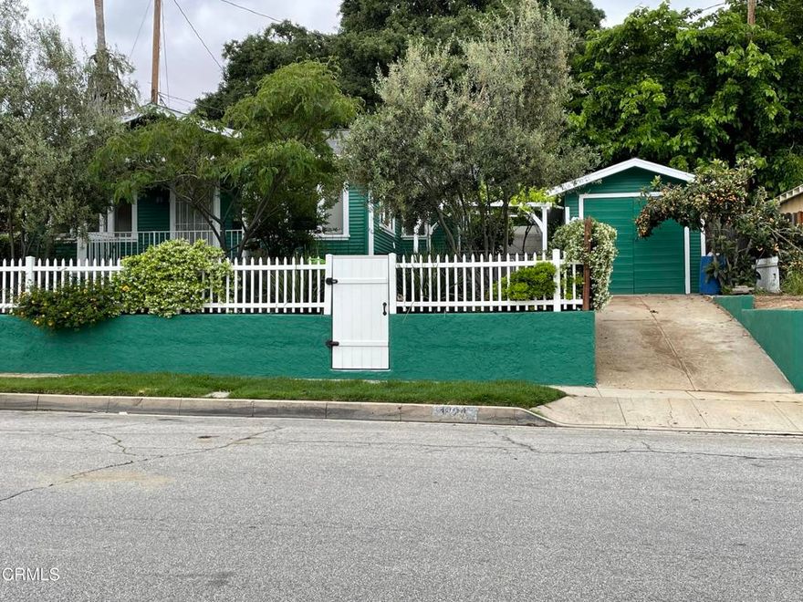 Welcome to this thoughtfully designed single-family home in Pasadena, which features 1 Bedroom, 1 DEN and1.5 bathrooms. Filled with natural light, this home is the epitome of cozy and charm. The plush landscape and unique serene backyard are ready to be enjoyed. The convenient laundry area is inside the house. The garage has been used as an artist studio; use your imagination and envision all the joys of having everything you need at one location. Built in 1925, this home is cheery and calming. Enjoy the beauty of olive trees and plush greenery. Tasteful updates throughout include wood block counter tops in a fairly new kitchen with refrigerator, dishwasher, stove, microwave, garbage disposal. New roof, and new exterior paint completed in 2023. Newer laminate flooring with light paint throughout. Low water landscaping with a vinyl fence Don't miss this opportunity to own your slice of Pasadena charm!