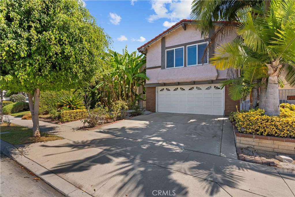 This enchanting two-story single-family home boasts four spacious bedrooms and 2 1/2 bathrooms, perfect for comfortable, living and entertaining. As you approach you’ll be captivated by the stunning front yard, offering a picturesque setting that enhances the home’s curb appeal.
Step inside to discover a warm and inviting den and family room where memories are waiting to be done, making the layout flow seamlessly, providing ample space for relaxation and gatherings with loved ones.
But the true gem of this property lies in its backyard Oasis. Imagine spending sunny afternoons by the tranquil pond hosting barbecues in the gazebo or cozy up around the fire pit on cool evenings, the ideal setting for entertaining friends and family or unwinding after a long day.
With a convenient two car garage and located in the vibrant city of Cerritos this home is surrounded by excellent schools, beautiful parks, and shopping centers, making it perfect for families and those who enjoy convenience. Plus, you’ll appreciate the easy access to the 5, 91 and 605 freeways for commuting and exploring the greater area.
This home truly combines charm, comfort and functionality. Don’t miss your chance to make this beautiful home your own!