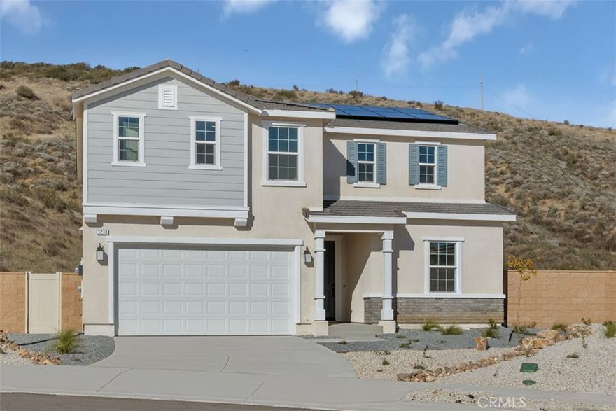 Beautiful Traditional style brand new home in the breathtaking scenic community of Vista Robles. This new home has an open concept floor plan. The large stylish kitchen that overlooks the huge great room is ideal for entertaining and holding big gatherings. Whirlpool® stainless steel appliances including over-the-range microwave with hood, dishwasher, and electric range are included. Quartz countertops and Cloud color Thermofoil cabinets highlight this beautiful modern kitchen. Sprawling lot is fantastic for creating the backyard that you have always wanted. Energy-efficient features includes LED lighting, Moen® WaterSense® faucets and shower-heads, hybrid electric hot water heater, and Sunrun® solar energy system (buyer must lease or purchase) that may help reduce monthly utility bills. Close to Oak Glen, Cabazon Outlets & Morongo Casino Resort & Spa. Easy access to I-10, CA 60 & Hwy 79. 
Photo is a rendering of the model! you can either purchase or lease the solar