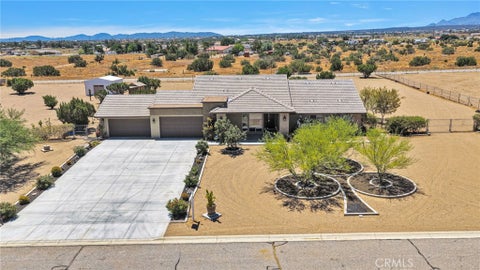 Photo of 9879 Silver Palm Drive, Oak Hills, CA 92344 (MLS # HD26148270)
