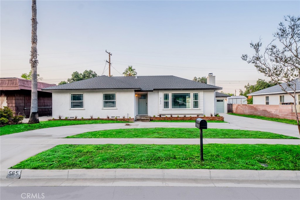 Modern Elegance Meets Everyday Comfort in North San Bernardino.
Impeccably upgraded with high-end finishes, this stunning single-story home in North San Bernardino blends modern sophistication with timeless charm. Featuring 3 spacious bedrooms and 2 stylishly renovated baths, this residence is sure to captivate from the moment you arrive.
A freshly seeded green lawn and vibrant new flower beds create irresistible curb appeal, while inside, clean lines and a contemporary palette set the tone. Step into a light-filled interior highlighted by recessed lighting, modern tile, wood laminate flooring, and designer fixtures throughout. A recently tiled fireplace serves as a striking focal point in the inviting living room, where expansive windows frame serene outdoor views.
Perfect for entertaining, the adjacent dining area flows seamlessly into a fully remodeled, open-concept kitchen. Here, you'll find stainless steel appliances, custom shaker cabinetry, quartz countertops, and a chic tile backsplash—every detail thoughtfully curated for style and function.
Retreat to well-proportioned bedrooms, each equipped with ceiling fans and generous closet space. The hallway bath impresses with modern finishes, including a sleek vanity, updated lighting, and a tiled shower/tub combo. Meanwhile, the primary suite offers a luxurious private bath with a large step-in shower and an abundance of natural light.
Enjoy sunny SoCal days in the expansive, private backyard—ideal for weekend BBQs, gardening, or relaxing under the stars. Additional highlights include a detached garage, brand-new HVAC system, tankless water heater, and an indoor laundry room for ultimate convenience.
Set in a desirable neighborhood close to schools, shops, and dining, this move-in-ready gem won’t last long. Schedule your private showing today!