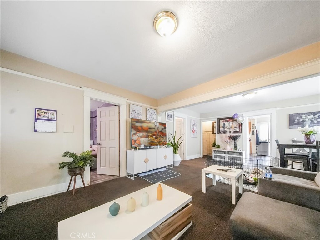 Welcome to this beautiful home situated in the heart of downtown Santa Ana, surrounded by a wonderful neighborhood with historic charm. The property offers three spacious bedrooms and one bathroom, providing comfortable living for families or individuals seeking a cozy space. With a generous lot size of 6,625 square feet, the expansive backyard resembles a private park—perfect for entertaining guests, unwinding, or creating a safe and playful environment for children and adults alike. Abundant plants contibute to a tranquil and comfortable atmosphere Move-in ready condition, Conveniently located near major freeways and Community Colleges
