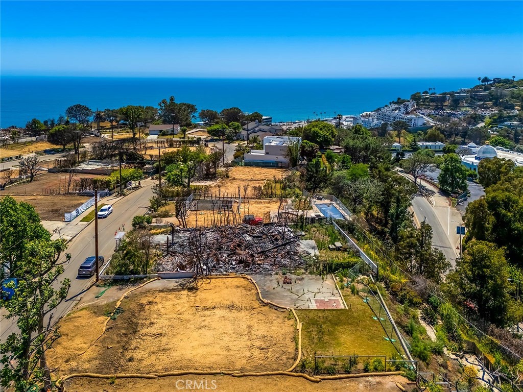 Great "view" development opportunity in the Marquez Knolls Bollinger Loop area of Pacific Palisades!! This property offers an unparalleled opportunity to create your dream estate with views of the ocean & Santa Ynez Mountains. The Palisades is an exclusive area re-nowned for panoramic views and easy access to Malibu, Santa Monica and Los Angeles. The Community boasts world class beaches, scenic coastal bluffs, premium shopping at Palisades Village, a top-rated school system(s) and hiking trails in nearby Will Rogers State Park that reach the famous Inspiration Point Loop!
Due to the devastating Palisades Fire last January, the house on this lot was destroyed. Phases 1 and 2 of the EPA hazardous waste cleanup are done and final sign-off received. This 10,771sf lot is ideal for a custom estate home development for a discerning buyer or investor. With the Palisades & Malibu undergoing a once in a lifetime transformation, this property is an exceptional opportunity for a buyer or investor looking to capitalize on one of LA’s most desirable coastal locations. Call for more details.