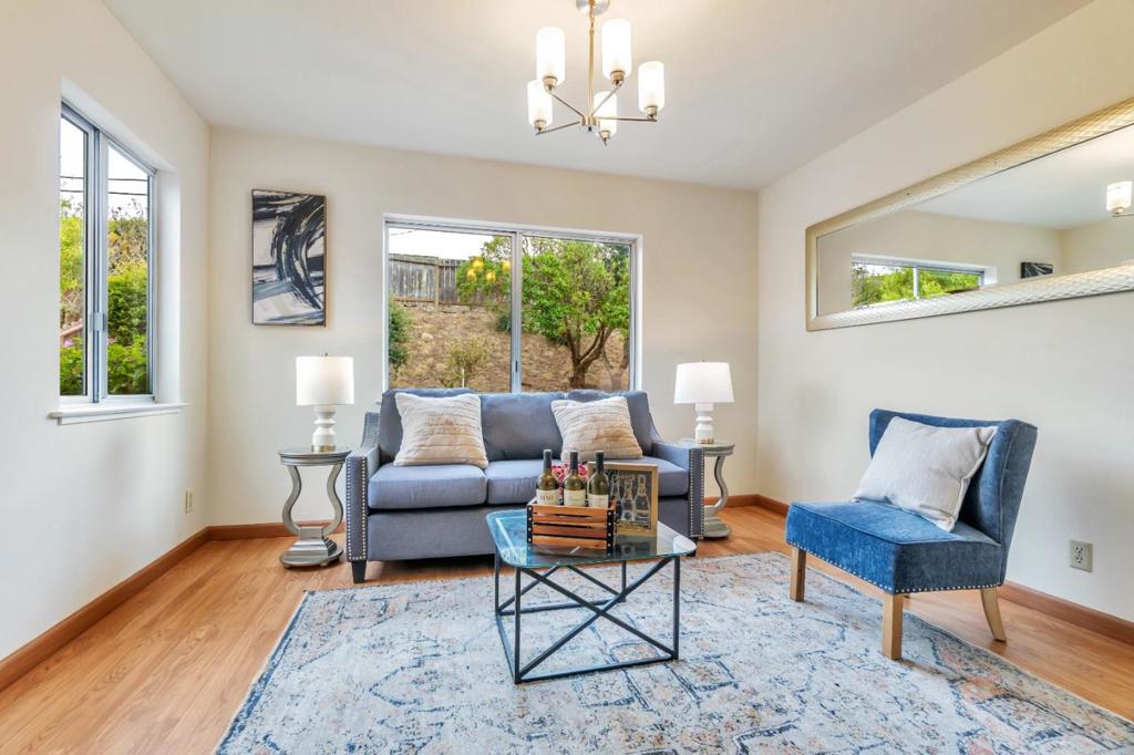 Welcome to this beautifully maintained 3-bedroom, 2-bathroom home located in the highly desirable Rollingwood area of San Bruno. Offering 1,240 square feet of comfortable living space, this charming residence features a thoughtfully updated kitchen with stainless steel appliances, gleaming hardwood floors, double-pane windows, fresh paint, and modern lighting throughout. Set on a spacious 5,976 square foot lot, the property boasts a large backyard perfect for outdoor entertaining, a generous driveway, and a 2-car garage. Nestled in a peaceful neighborhood, you'll enjoy the quiet surroundings while still being conveniently close to shopping, dining, and public transportation. Commuters will also appreciate the easy access to Highways 280, 380, and 101 making travel throughout the Bay Area effortless. Don't miss your opportunity to own this wonderful home. Schedule your visit today!