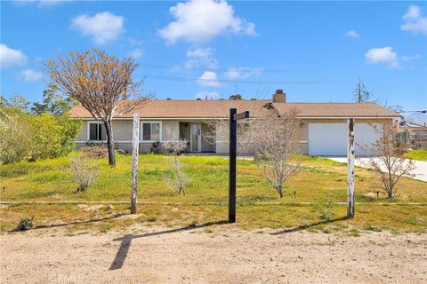 Photo of 11591 Kiowa Road, Apple Valley, CA 92308 (MLS # HD26045469)