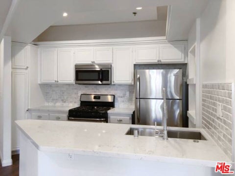 Photo of 12712 MOORPARK Street #103, Studio City, CA 91604 (MLS # 26862001)