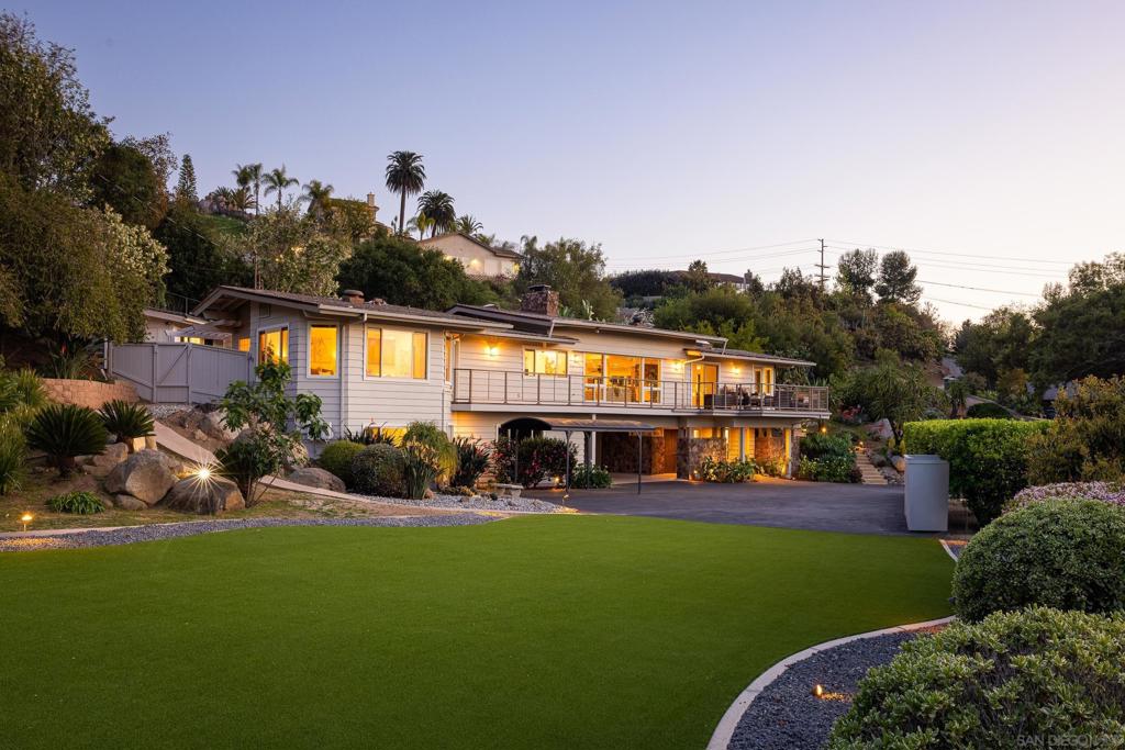You Won’t Believe What’s Inside This Green Valley Estate – A True Poway Paradise! Discover an extraordinary opportunity to own a one-of-a-kind estate in the highly sought-after Green Valley neighborhood of Poway. Nestled on 1.56 acres of lush, private land, this 4,062 sq. ft. residence (including a 300 sq. ft. casita) seamlessly blends luxury, comfort, and breathtaking natural beauty. Step inside an open-concept masterpiece, where upgraded hardwood floors lead you through elegant living spaces. The chef’s kitchen is designed to impress, featuring professional-grade appliances, cherry wood cabinetry, and granite countertops—all flowing effortlessly into the expansive living room. Walls of glass invite you to a sprawling deck that spans the length of the home, offering stunning north-facing panoramic views—perfect for relaxing or entertaining under the stars. This exceptional home boasts 4 bedrooms & 3 baths, including a lower-level suite with a full bath—ideal for multigenerational living or guests. The separate casita is a private retreat with a Murphy bed and full bath, perfect for a home office, gym, or visitors. Outside, a private backyard oasis awaits, complete with a saltwater pool featuring a slide, passive solar heating, and a soothing hot tub. Stroll through your very own orchards, where avocado trees and a variety of fruit trees flourish. With owned solar, your eco-friendly lifestyle is ready to go. There is also an optional area for an additional driveway and walkway to lead to a location for installing a main entrance door, which accesses the upper primary level, thereby avoiding the need to use stairs. Ideally located near shopping, fine dining, parks, and scenic walking trails and set within the award-winning Poway Unified School District, this home offers the best of tranquil luxury and convenience. Experience the perfect blend of tranquility and luxury in one of Poway’s most desirable enclaves.