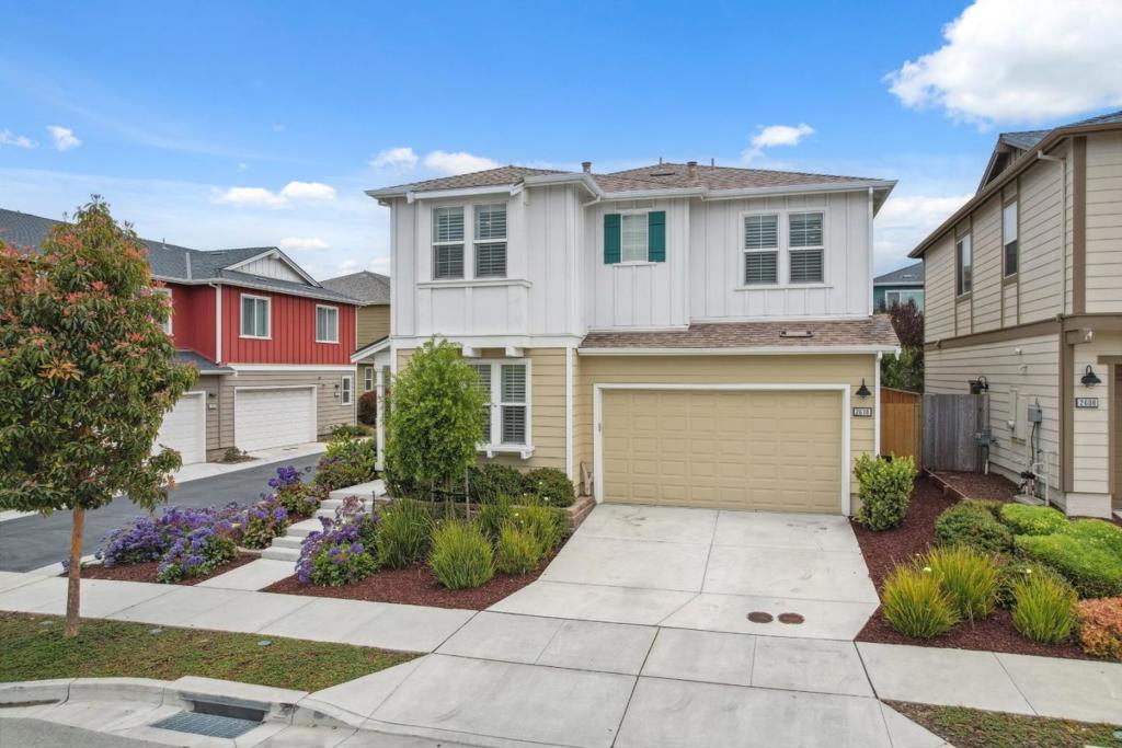 Welcome to 2610 Lighthouse Lane, a stunning 4-bedroom, 3-bath coastal retreat in The Dunes on Monterey Bay, one of Marinas most desirable neighborhoods. This light-filled home offers an open-concept floor plan with high ceilings, large windows, and elegant finishes throughout. At its heart is a chefs kitchen with dual ovens, a large eat-in island, premium stainless steel appliances, stone countertops, and ample cabinetry perfect for gourmet meals or entertaining. The living and dining areas flow to a backyard oasis with a hot tub, mature landscaping, and ambient lighting, perfect for relaxing or entertaining family and friends. Upstairs, the serene primary suite features a spa-inspired bath with dual vanities, soaking tub, walk-in shower, and spacious closet. Two additional bedrooms share a full bath, while a downstairs bedroom and bath offer ideal guest or office space. Additional highlights include a two-car garage, upstairs laundry, bonus den area, smart home upgrades, owned solar, and durable hardwood flooring throughout. Close to trails, parks, shopping, and dining this home offers convenient, refined coastal living at its best. Dont miss this rare opportunity to own a turnkey home with modern amenities in the heart of Marinaschedule your private showing today.