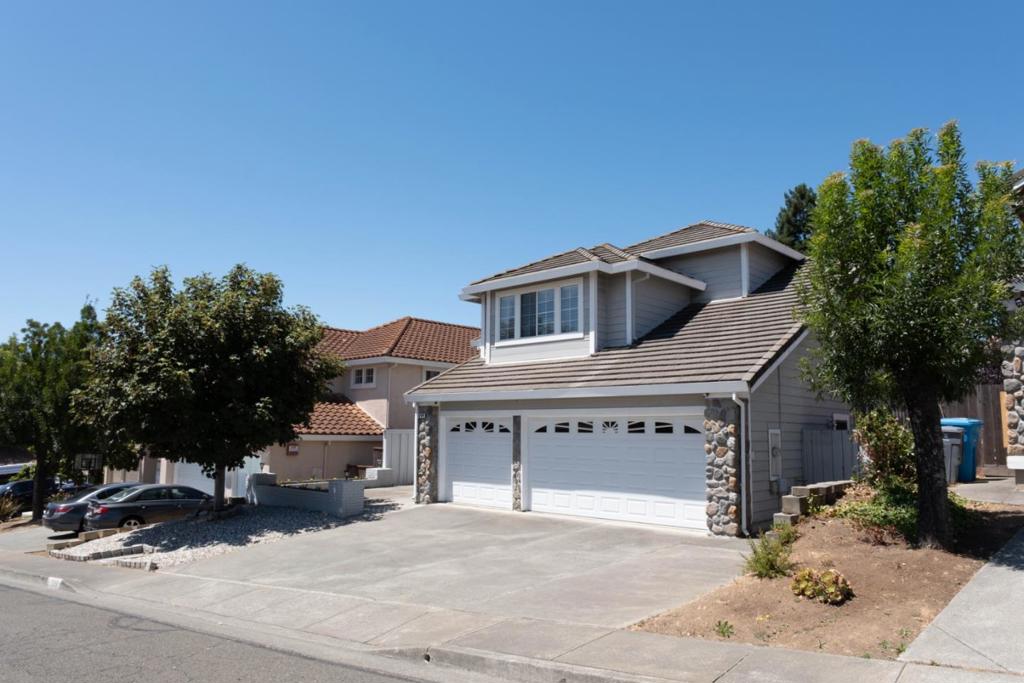 Welcome to this spacious 4-bedroom, 3-bathroom home located in the vibrant city of Vallejo. With a minimum lot size of 6,683 square feet, this property offers ample space for comfortable living. The home features a well-appointed kitchen equipped with gas hookups, an oven range, and a refrigerator, perfect for those who love to cook and entertain. Enjoy the convenience of the Kitchen/Family Room combo, which beautifully complements the separate family room. The flooring throughout is stylish laminate, providing a modern touch to the interior spaces. Stay cozy in the living area with a central forced air heating system and a charming fireplace. The laundry room is equipped with a dryer, washer, and electricity hookup (220V), making laundry chores a breeze. This home is situated within the Vallejo City Unified School District, providing access to local elementary schools. With no formal dining room, enjoy dining in the living room for a relaxed atmosphere.