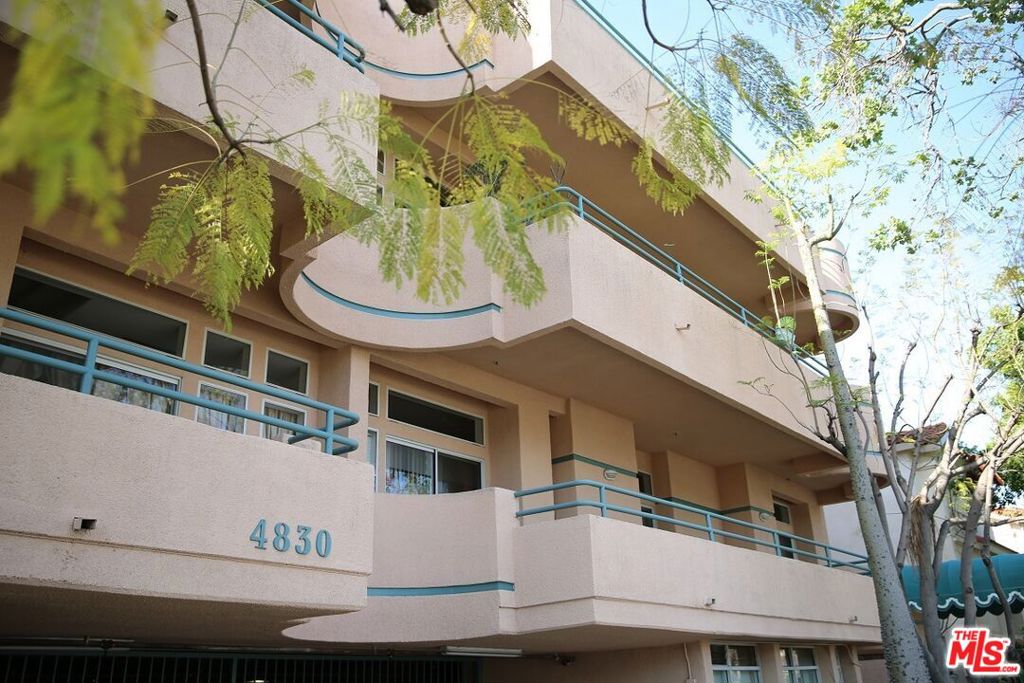 SEPARATED BEDROOMS FOR PRIVACY. LARGE 2 BED 2 BATH CONDO IN QUIET NEIGHBORHOOD, ADJACENT TO HANCOCK PARK AND LARCHMONT. NEW LIGHTINGS, ALL APPLIANCE INCLUDED. WASHER/DRYER INSIDE THE UNIT. LARGE BALCONY. GRANITE COUNTER TOPS. VAULTED HIGH CEILING. WET BAR. 2 CAR ASSIGNED PARKING SPACES. CLOSE TO RESTAURANTS AND MARKET. CLOSE TO 101 FREEWAY TO HOLLYWOOD OR DOWNTOWN LA.