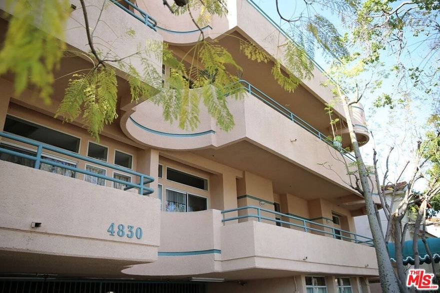 SEPARATED BEDROOMS FOR PRIVACY. LARGE 2 BED 2 BATH CONDO IN QUIET NEIGHBORHOOD, ADJACENT TO HANCOCK PARK AND LARCHMONT. NEW LIGHTINGS, ALL APPLIANCE INCLUDED. WASHER/DRYER INSIDE THE UNIT. LARGE BALCONY. GRANITE COUNTER TOPS. VAULTED HIGH CEILING. WET BAR. 2 CAR ASSIGNED PARKING SPACES. CLOSE TO RESTAURANTS AND MARKET. CLOSE TO 101 FREEWAY TO HOLLYWOOD OR DOWNTOWN LA.