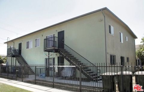 Photo of 9004 S San Pedro Street, Los Angeles, CA 90003 (MLS # 25528683)