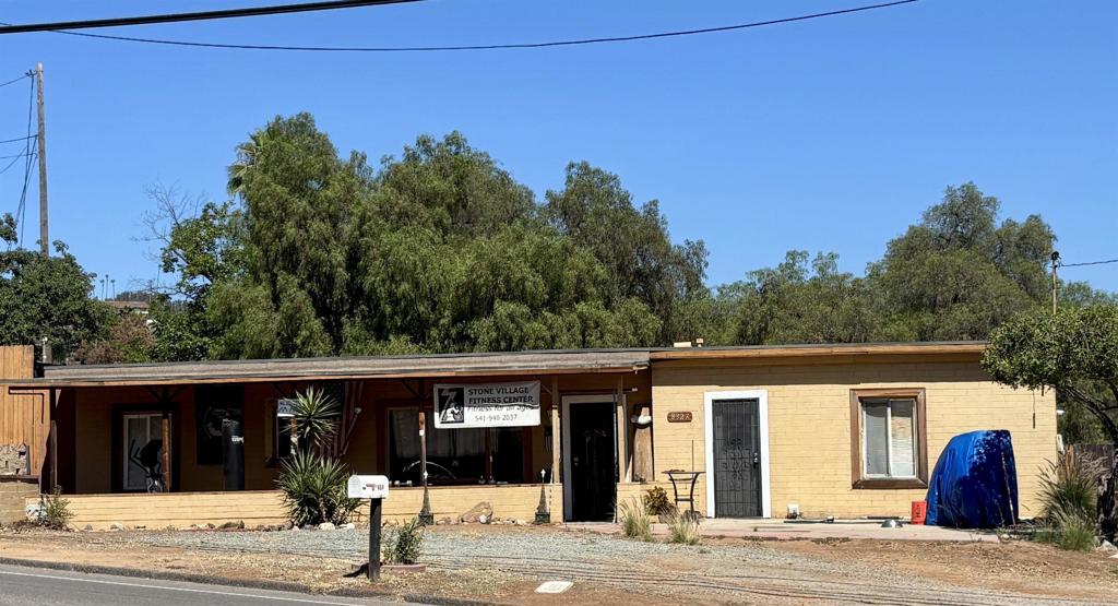 Opportunity is knocking AND it brought a toolbelt! This 2-bedroom, 1-bath fixer-upper sits on a flat 1/2 acre of land with R2 zoning, which means you've got options, baby! Whether you're dreaming of a second unit, a duplex, or just some solid rental income, this property is ready to work as hard as you do. The layout is simple, the bones are solid, and the lot is wide open for your imagination and an ADU! Potential in undeniable! If you're looking for land, location, and a chance to create something amazing, this is your moment. Not for the faint of heart… but definitely for the smart investor who sees gold where others can't see.