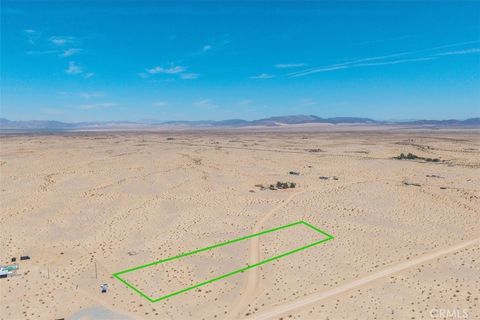 Photo of 82935 Maya Rada Road, 29 Palms, CA 92277 (MLS # JT25279283)