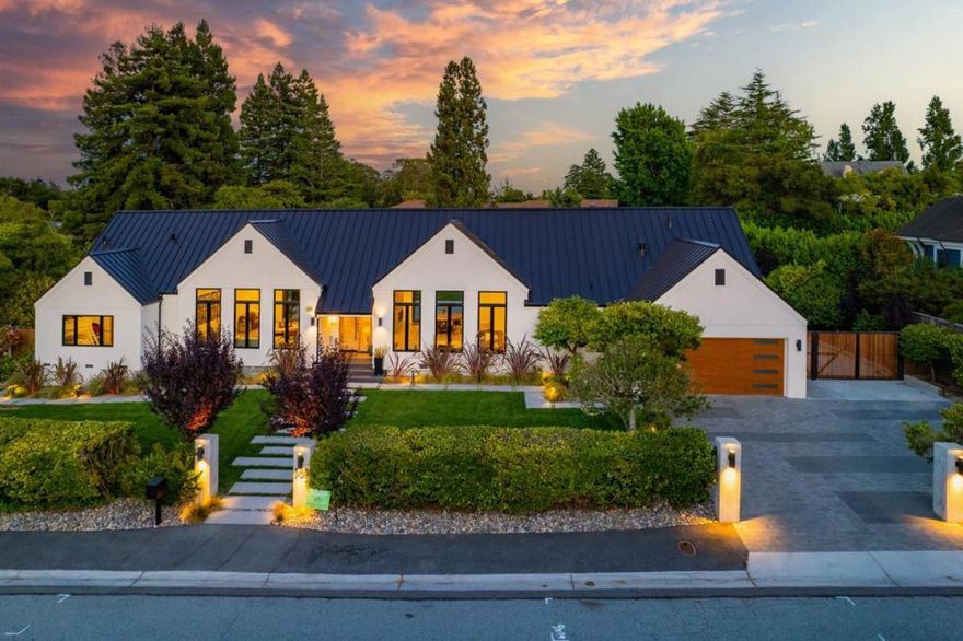 Step into your modern farmhouse masterpiece in the coveted Carolands neighborhood of Hillsborough. Situated on a flat and spacious half-acre lot, this home has undergone a complete renovation and expansion, ensuring a modern and comfortable living experience. The main house offers 4 bedrooms and 4 bathrooms, with the added bonus of a brand new ADU that includes a 5th bedroom and additional bath. Inside, discover 16-foot ceilings, stunning wood floors, abundant natural light, and premium upgrades throughout. The chef's kitchen features Thermador appliances and an 11-foot island, with La Cantina doors creating seamless indoor-outdoor flow. Outside, your private oasis awaitswith a beautiful pool, bocce ball court, and plenty of room to relax or entertain. The 775 sq ft ADU is versatile and perfect for guests, a home office, or extended family. This property perfectly blends modern living, luxury, and space in the sought-after Carolands neighborhood. Welcome home!