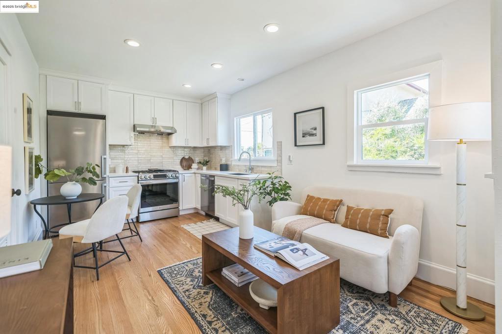 Welcome to this beautifully renovated 2-bedroom, 1-bathroom condo (TIC) that offers both privacy and modern living. This is also a great investment opportunity—perfect for house hacking. Live in one unit and rent out the other, or build your portfolio in one of the East Bay’s most desirable neighborhoods. This bright and stylish home features an updated kitchen and bathroom with brand-new appliances, a mini-split HVAC system, sleek modern finishes, and thoughtful upgrades throughout.Step outside to your own private patio oasis with newly installed turf—perfect for relaxing, entertaining, or easy-care gardening. The low-maintenance yard is surrounded by a beautiful garden that adds charm and tranquility to your outdoor living space. Enjoy the best of urban convenience with popular restaurants and coffee shops just blocks away, and effortless commuting with Ashby BART station only 4 minutes away and UC Berkeley just a 6-minute drive.
