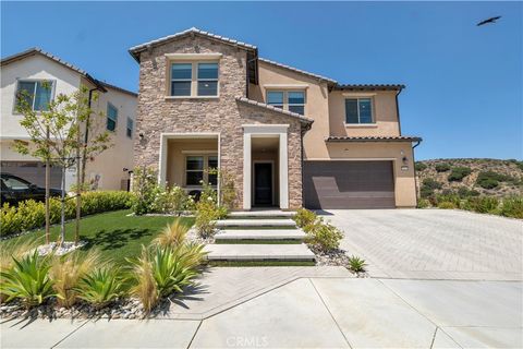 Photo of 21611 Canyon Cove CV, Chatsworth, CA 91311 (MLS # SR26096686)