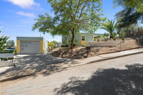 Photo of 5026 Eaton Street, Los Angeles, CA 90042 (MLS # P1-27899)
