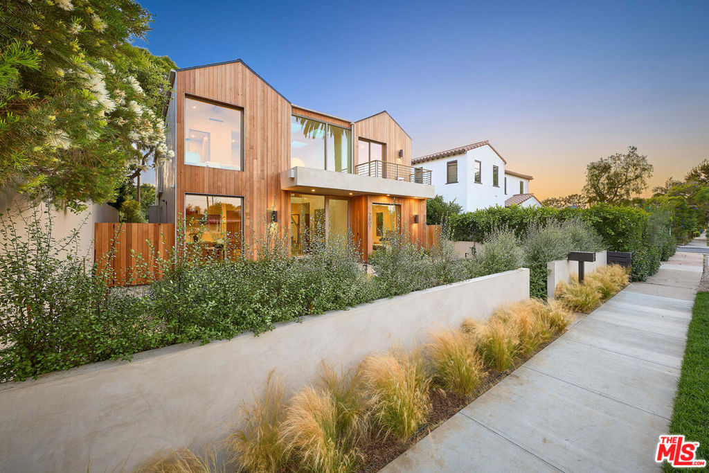 **Call for Offers -- Deadline: 5PM, Monday, July 21st. The seller will engage at prevailing market pricing.** A true architectural gem, this nearly 4,100 sqft residence seamlessly blends modern elegance with the warmth of Scandinavian design. Situated just east of Lincoln Blvd, it is a testament to refined craftsmanship and the quintessential West Los Angeles indoor-outdoor lifestyle. Designed to elevate both style and functionality, the primary residence features 5 bedrooms and 4.5 bathrooms. A detached, second-story ADU -- ideal for guests, a home studio, or rental income -- adds an additional bedroom and bathroom, bringing the total room count to 6 bedrooms and 5.5 bathrooms. Soaring ceilings and a striking skylight arrangement flood the interiors with natural light, accentuating the exquisite European white oak flooring and minimalist yet inviting design. The open-concept living space features floor-to-ceiling sliding doors that vanish, seamlessly connecting the indoors to the serene backyard retreat. A custom-designed staircase leads to the private quarters, where the primary bathroom boasts a spa-like ensuite bath and oversized shower with dual shower heads. Finally, the outdoor sanctuary is perfect for entertaining or intimate gatherings, featuring an in-ground pool, outdoor grilling area, and lush landscaping that create a private haven. Just one mile from the famed Abbot Kinney Blvd, this home is a rare blend of sophistication, tranquility, and prime location.