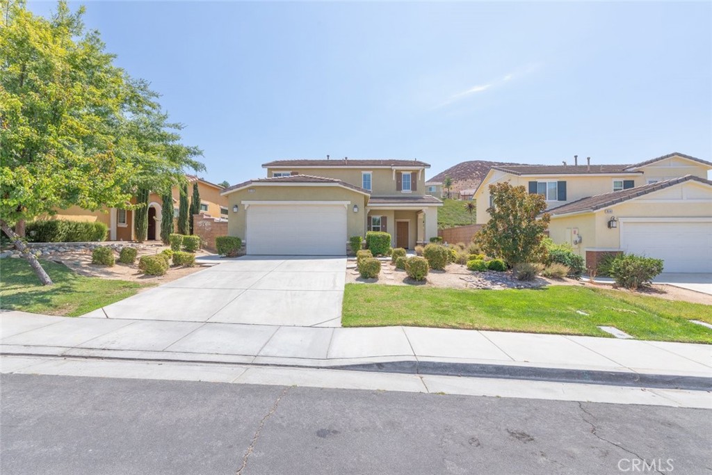 Tucked in a serene cul-de-sac, this impeccably maintained Canyon Hill home features an open floor plan bathed in nature light. The 4 bedrooms/ 3 bathrooms residence showcases a gourmet kitchen with granite countertops and new stainless steel appliances. Gleaming hardwood floors and fresh paint create a warm, inviting atmosphere throughout. The expansive master suite, complete with dual vanity, offers luxurious retreat. The beautifully landscaped backyard, with artificial turf , a mini-golf putting area, and a spacious concrete patio, is perfect for outdoor entertaining. Located near the highly sought-after Herk Bouris elementary school, the award-winning Canyon Hills master planned community offers three community pools, spa, splash pad and two parks --including a sports park ---and a convenient shopping plaza.