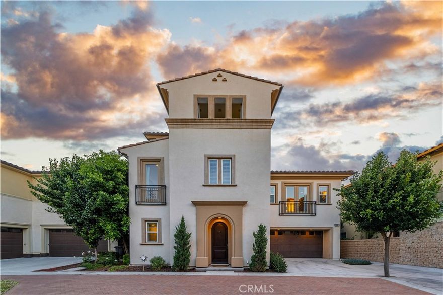Located in the gated community of Parkside, this former Toll Brothers model home offers three levels of stylish living with high ceilings, hardwood floors, and an open floor plan. The gourmet kitchen features built-in appliances, full-height designer cabinets, a large island, and wine storage, flowing seamlessly into the great room and out to a private courtyard with a California room, ceiling fans, spa pool with water feature, and built-in BBQ. All four bedrooms are located on the second floor, including a spacious primary suite with a luxurious bath, oversized shower, dual vanities, soaking tub, and walk-in closet. A large entertainment room with a bar, its own A/C, and outdoor deck occupies the third floor. Community amenities include a clubhouse with pool, spas, BBQ area, dog park, and a large sports park nearby. Conveniently located with easy access to the 5 and 241 freeways, Foothill Ranch Town Centre, and award-winning schools. Fully furnished.