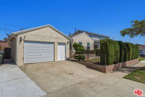 Photo of 11612 Cimarron Avenue, Hawthorne, CA 90250 (MLS # 26871637)