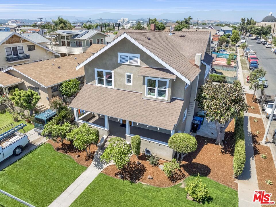 ATTENTION BUYER: A $25,000 INCENTIVE BEING GIVEN TO BUYER WITH A SERIOUS AND SOLID OFFER. TO HELP COVER CLOSING COST OR FOR BUYER TO DO AS THEY WISH! Just appraised at $1,160,000, this turnkey 5-bedroom, 4-bath, 2,433-square-foot Craftsman in Boyle Heights blends historic character with modern luxury. The home opens with a classic front porch for morning coffee and flows into a bright living room anchored by an original fireplace, recessed lighting, ceiling fans, and waterproof SPC flooring. The fully remodeled kitchen features new wood cabinetry, quartz countertops, and a built-in dishwasher. The primary has a new spa-style bathroom complete with a soaking tub and showcases premium tile, contemporary vanities, and all-new fixtures. Energy-efficient dual-pane windows flood every room with natural light, and behind the scenes you'll find a new 200 AMP electrical panel, central A/C, tankless water heater, and updated copper plumbing and ABS drains. Outside, fresh stucco, a 30-year cool shingle roof and a charming wood balcony frame a professionally landscaped yard with fresh sod and an automated sprinkler system. Just minutes from Downtown LA's parks, cafs, and cultural hotspotsand perfectly positioned in a walkable neighborhoodthis fully updated Craftsman blends historic charm with modern conveniences. Schedule your tour today before this rare opportunity moves to its next chapter.
