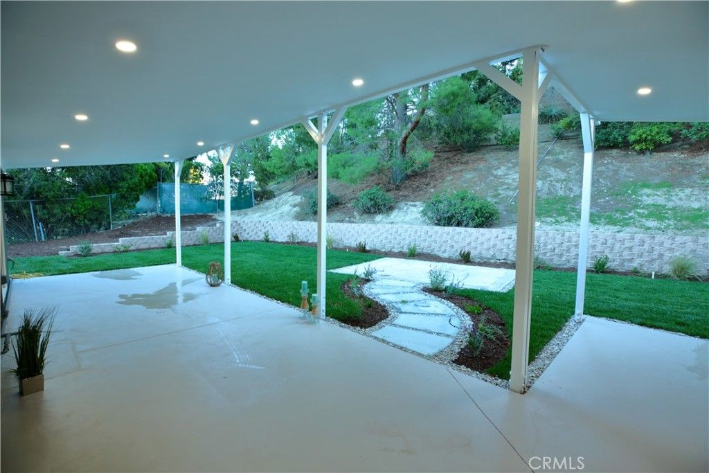 Photo of 17350 Firma Court, Granada Hills, CA 91344 (MLS # GD25254200)