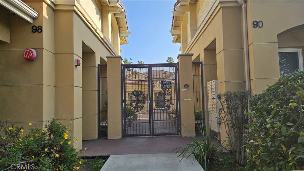 This beautiful Townhome is in a very private and quiet gated community and is conveniently located in one of Pasadena's most desirable neighborhoods. On the first floor, the living room with a high ceiling features a modern fireplace and it is adjacent to the kitchen. The gourmet kitchen features a black granite countertop and an island. The kitchen also has stainless steel appliances. Next to the kitchen is the dining room with glass French doors opening to the small backyard. The first floor also features a half bathroom with a sink and a toilet. The stacked laundry machines are in a closet on the first floor. Down to the steps the direct-accessed two-car garage is in there. The garage features an automatic garage door opener. On the upstairs, there are two good-sized bright and sunny bedroom suites each with their full bathrooms and two closets. The central Air Conditioning and Heating with Google Nest thermometer keeps the house comfortable. Laminate wood floors are throughout the home. This is truly a beautiful and comfortable home for everybody.