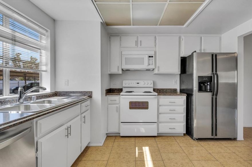 I'm excited to present this nicely updated 2-bedroom, 1.5-bathroom condo in a prime location! Recently refreshed with a coat of paint. Enjoy the comfort of carpet installed throughout the living areas and bedrooms. The kitchen boasts newer stainless steel appliances. The thoughtful layout includes a convenient in-unit laundry area tucked neatly under the stairs, offering ample storage space. Upstairs, you'll find two generously sized bedrooms, one of which boasts a private en-suite full bathroom. A half-bath is conveniently located downstairs for guests. Step out onto your private patio and enclosed yard through the slider door - perfect for relaxing or entertaining. Adult applicants must apply and participate in credit, criminal background, and eviction screening. No bankruptcies, no evictions, verifiable rental payment history. Good credit. Verifiable monthly income of 3 times the monthly rent. To schedule an appointment please text Ana listing agent at (760) 641-7226 for a quick response.
