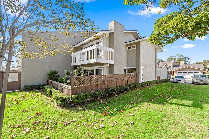 Back on the market. Enjoy coastal sophistication in this impeccably appointed 2-bedroom, sunny, corner location view residence. Rare Huntington Viewpoint opportunity:  Located within the tranquil, tree-lined community, the home offers views from the primary suite’s private balcony and the main-floor living room’s expansive landscaped patio, creating a seamless connection to the surrounding natural beauty.
Enter from your two-car garage or the gated courtyard to a relaxing patio and once inside you will immediately feel the care and attention to detail put into this home with expansive high ceilings and exquisite upgrades including flooring, custom patterned carpet, dual pane windows, custom woven wood shades. Kitchen features custom high-end cabinetry with spindle details and glass-front doors, creating a warm and inviting atmosphere. Kitchen offers a perfect balance of elegance, comfort, and functionality.  Upstairs you will find a generously sized bedroom and remodeled hall bathroom with bathtub. Down the hall is the oversized primary bedroom featuring a balcony with views, vaulted ceiling, two generous sized closets and a remodeled bathroom with a claw-foot tub and ample storage. 
Set within a serene community, residents enjoy privileged access to meticulously maintained amenities including a sparkling pool and tennis courts. All of this is located just moments from the beach—offering a rare blend of privacy, prestige, and the ultimate coastal lifestyle.