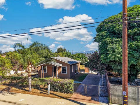 Photo of 921 W Grand AVE, Pomona, CA 91766 (MLS # CV26180308)