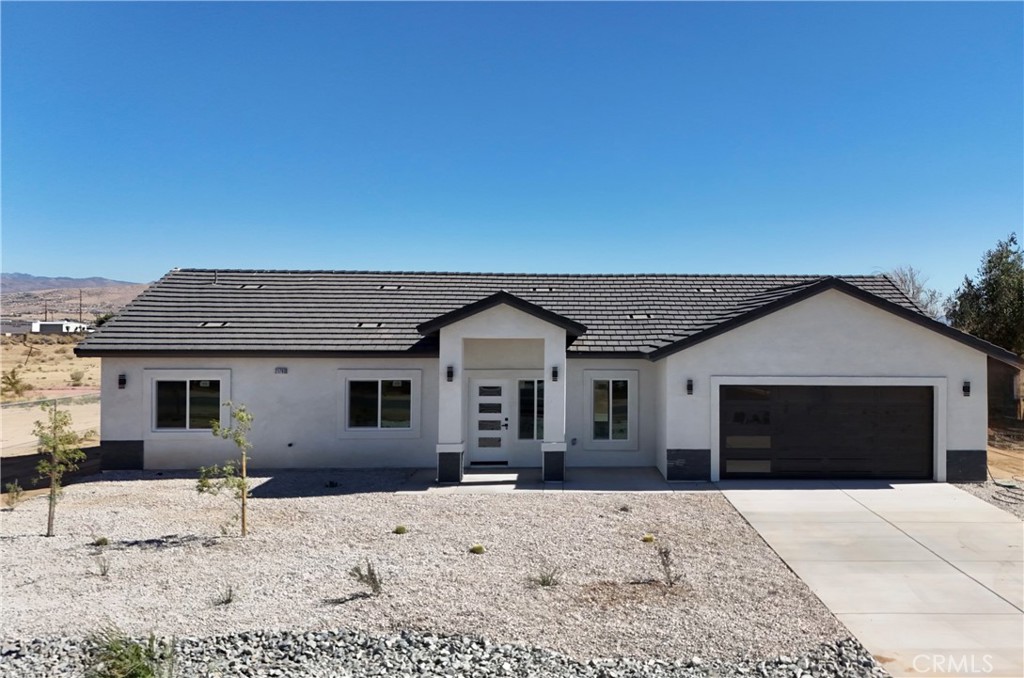Welcome to this NEW CONSTRUCTION HOME built in 2025. This Residence is located in the city of Apple Valley Off of Bear Valley Rd and Navajo Rd. It is close to Grocery Stores, Parks, Libraries, and Schools. This Property Features an Open, Spacious Kitchen equipped with soft-close cabinets, a new dishwasher, and a Stove also equipped with quartz marble countertops and a Backsplash, as well as its own Dining room. Quartz countertops are also included in the bathrooms. Two Master bedrooms One featuring a Marble walk-in shower. This Residence also has an open, spacious family room! Beautiful Tile Flooring is equipped throughout the house and all Bedrooms are equipped with Carpet. 3 Full Bathrooms, 4 Bedrooms, Featuring two master bedrooms. To top it off, you get fully paid off Solar Panels with this property. This Home is ready for Move in !