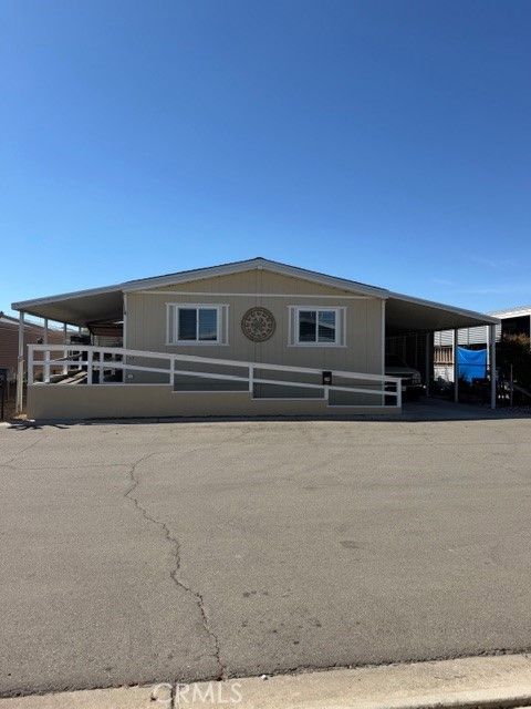 Photo of 9161 Santa Fe Ave E #39, Hesperia, CA 92345 (MLS # DW26063869)