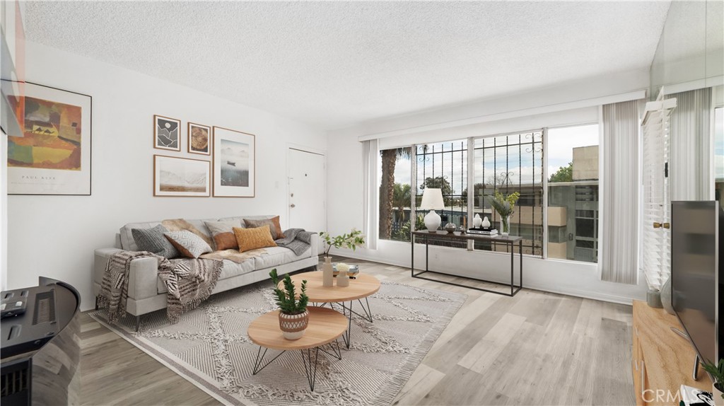 STUNNING beautifully maintained 1-bedroom, 1-bathroom condo in the heart of Baldwin Hills! This inviting unit offers a spacious and open floor plan, featuring abundant natural light and modern finishes throughout. The cozy living area seamlessly connects to a well-appointed kitchen, perfect for entertaining or relaxing after a long day. The bedroom is generously sized, offering ample closet space, while the bathroom boasts sleek fixtures and a contemporary design. Additional highlights include hardwood flooring, updated appliances, and a private balcony/patio, ideal for enjoying the beautiful Los Angeles weather. Nestled in a well-maintained community. Located just minutes from Kenneth Hahn Park, the Expo Line, Culver City, and vibrant shopping and dining options, this is the perfect home for first-time buyers, professionals, or investors looking for a prime location in L.A. Don’t miss out on this Baldwin Hills gem—schedule a tour today! REO LISTING AND PROPERTY IS VIRTUALLY STAGED.