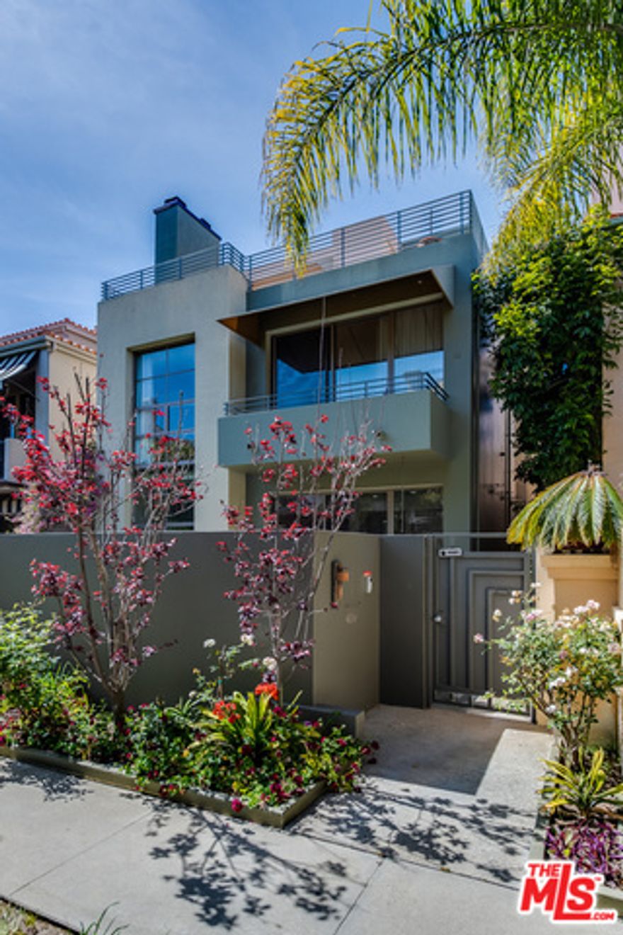 Modern Luxury Lease in the Silver Strand, Marina Del Rey.  Live the coastal lifestyle in this spectacular four-story modern estate, ideally located in the prestigious Silver Strand, just a short stroll to the beach. Offering over 6,452 sq. ft.* of stylish living space, this home is designed for comfort, convenience, and entertainment. Enjoy the private elevator, sparkling pool, flexible gym space, and expansive rooftop decks with Nice views, amenities rarely available in a lease property.  Inside, soaring ceilings, hardwood floors, and recessed lighting create a sleek and modern atmosphere. The spacious living room with fireplace opens directly to the pool, while the gourmet center-island kitchen with stainless steel appliances flows into the family and breakfast areas. A semi-formal dining room adds flexibility for gatherings.  The luxurious primary suite includes a fireplace, sitting area, private balcony, spa-like bath with soaking tub and separate shower, and an oversized walk-in closet. Additional en-suite bedrooms feature floor-to-ceiling windows for abundant natural light, plus a library for quiet work or study.  The third level offers a private suite, recreation room, powder room, and access to two rooftop decks perfect for entertaining or relaxing at sunset. The lower level features a guest suite and a gym, making the home ideal for both wellness and hosting.  With 5 bedrooms, 7 bathrooms, and resort-style amenities, this residence offers the ultimate in modern coastal living ready to welcome its next tenant.