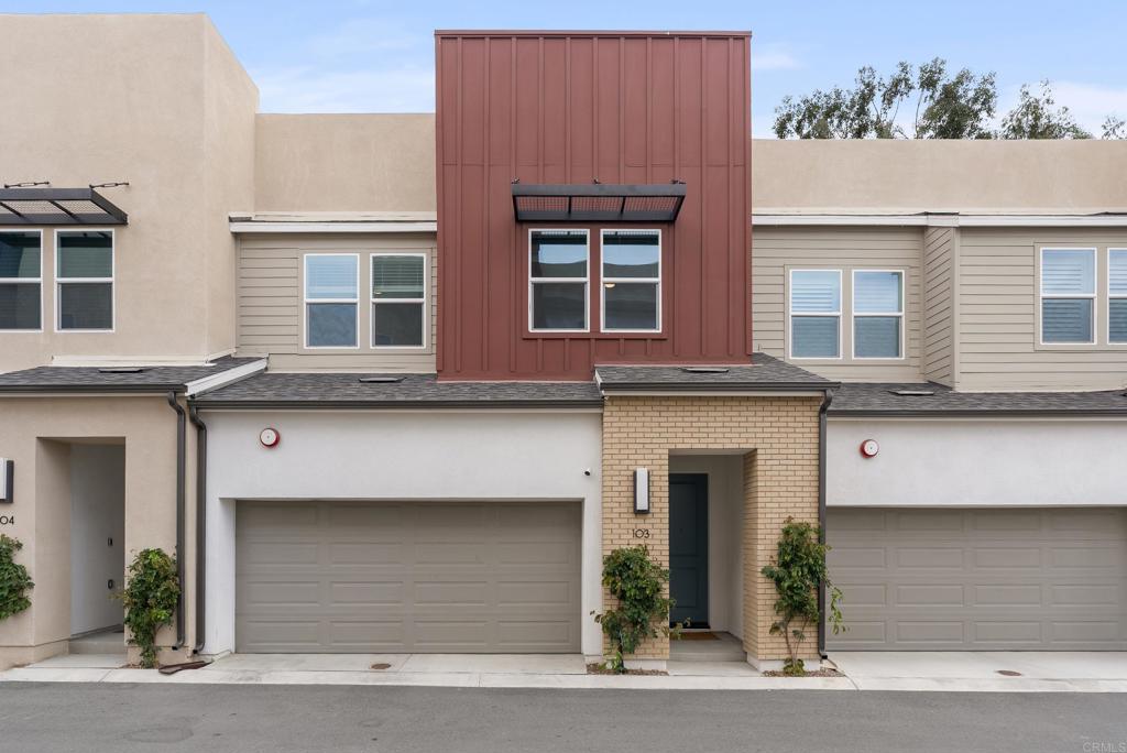 Walk into this stunning, modern 2-story townhome built in 2023 and discover your dream home! With soaring 9' and 10' ceilings and elegant custom wall paneling throughout, this residence blends style with functionality. The spacious primary suite boasts two large custom walk-in closets, offering both luxury and organization. Enjoy a private yard with low-maintenance turf, perfect for relaxing or entertaining. The epoxy-finished garage flooring, custom blinds on the first floor, and owned solar power system add to the home’s thoughtful upgrades. The designer kitchen is a chef’s delight, featuring quartz countertops, flat panel soft-close cabinets, and LG stainless steel appliances including an induction cooktop. Additional highlights include a smart learning thermostat, dual-glazed windows for energy efficiency, keyless entry, and an attached two-car garage. This townhome combines modern design, high-end finishes, and energy efficiency—ready for you to move in and make it your own!