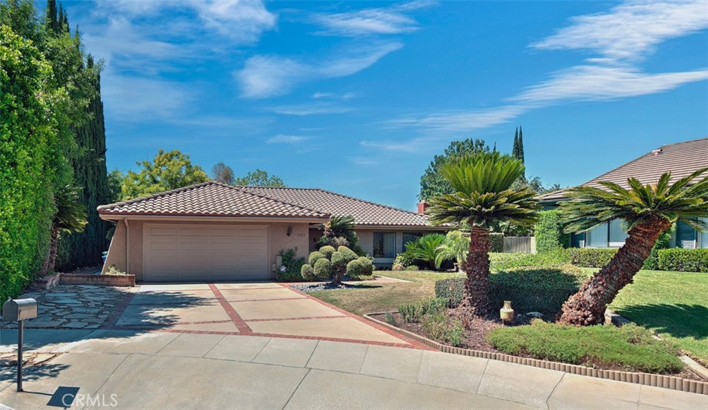 This Wonderful One-Level family home with Great curb appeal located on a Cul-de-sac is waiting for your Special Cosmetic Touches. Some of the large ticket items have already been upgraded a few years back including the Roof, Central Air and Heat, the flooring in the Family Room and Hallway, and the resurfacing of the Pool. In addition to the 3 Bedrooms and 2 Bathrooms there is also a large Living Room/Dining Room combo, a Family Room and a large Game Room. The Living Room has a Gas Fireplace, Plantation Style Shutters and a Beautiful View of the Foothills. The Backyard is Large and boasts a Pool and Spa, Barbecue area, a Covered Patio, a nice lawn area and lots of mature trees. This home also belongs to the Award Winning Arcadia School District. Don't miss out on this Great Opportunity.