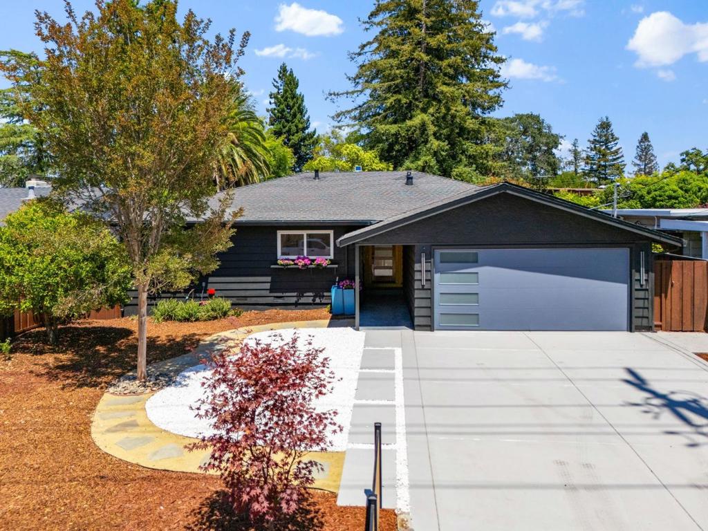 Experience contemporary comfort in this stunningly updated 4-bedroom home featuring 1,951 sq ft of stylish living space on a spacious 6,750 sq ft lot, including 2 luxurious full bathrooms and an additional half-bath, perfect for guests. This thoughtfully remodeled home blends modern style with functional design, ideal for todays lifestyle. Step inside to soaring natural light, an open-concept floor plan featuring spacious living and dining areas, a beautifully updated kitchen with quality finishes, and tastefully renovated bathrooms. The generous bedrooms offer flexibility for family, guests, or a home office setup. A bright and inviting family room with French doors opens to the backyard, creating a seamless indoor-outdoor connection. The versatile space offers additional room for a play area, workout zone, or creative retreat. The private backyard provides the perfect setting for outdoor entertaining or quiet relaxation. Recent upgrades include flooring, lighting, fixtures, and fresh landscaping all done with quality in mind. Located just minutes from downtown Menlo Park, Stanford University, top-rated schools, and major commuter routes, this move-in-ready home offers the best of Silicon Valley living.