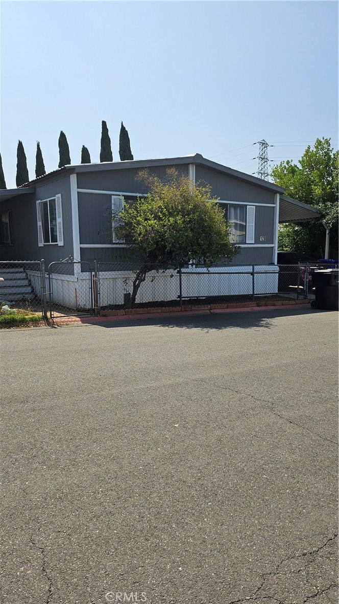 Welcome to the Bravo Community gated family park. Nice 3 Bedroom, 2 bath Mobile home, featuring 1440 Sq. Ft of living space, nice kitchen with new cabinets, and new floor, dishwasher, washer and dryer hookups, double sink in master bedroom and window shutters. The open floor plan, indoor laundry area, and ideal bedroom layout is perfect for any family. The gated yard offers space for outdoor enjoyment, extra storage shed and parking for 3 cars. The community amenities include pool, spa, clubhouse and playground. Don't miss the opportunity to own this amazing Mobil home in Jurupa Valley, close to freeways, shopping, school and outdoors activities.