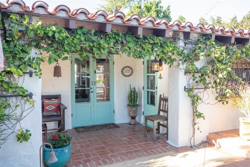 Historic Spanish-Inspired Coastal Retreat in Capistrano Beach
Discover a rare opportunity to own a Spanish-style historic home in Dana Point’s coveted Capistrano Beach. Built in 1929 by the Doheny family and designed by renowned architect Roy C. Kelley, this single-level residence blends timeless elegance with modern updates. Once home to celebrated artist Louise Leyden, this property is more than a house, it’s a piece of Southern California history. Listed on the historic register, it offers exceptional property tax savings and unmatched architectural significance. Just blocks from Pines Park with its panoramic ocean views and breathtaking sunsets, this home is the ultimate coastal retreat. Inside, authentic charm shines through original door hardware, antique light fixtures, and period wood plank floors. Hand-painted exposed ceilings add artistic flair, while the central courtyard—with its wood-burning fireplace—creates a seamless indoor-outdoor flow perfect for entertaining. Don’t miss your chance to own this iconic Dana Point home and experience the beauty of Capistrano Beach living!