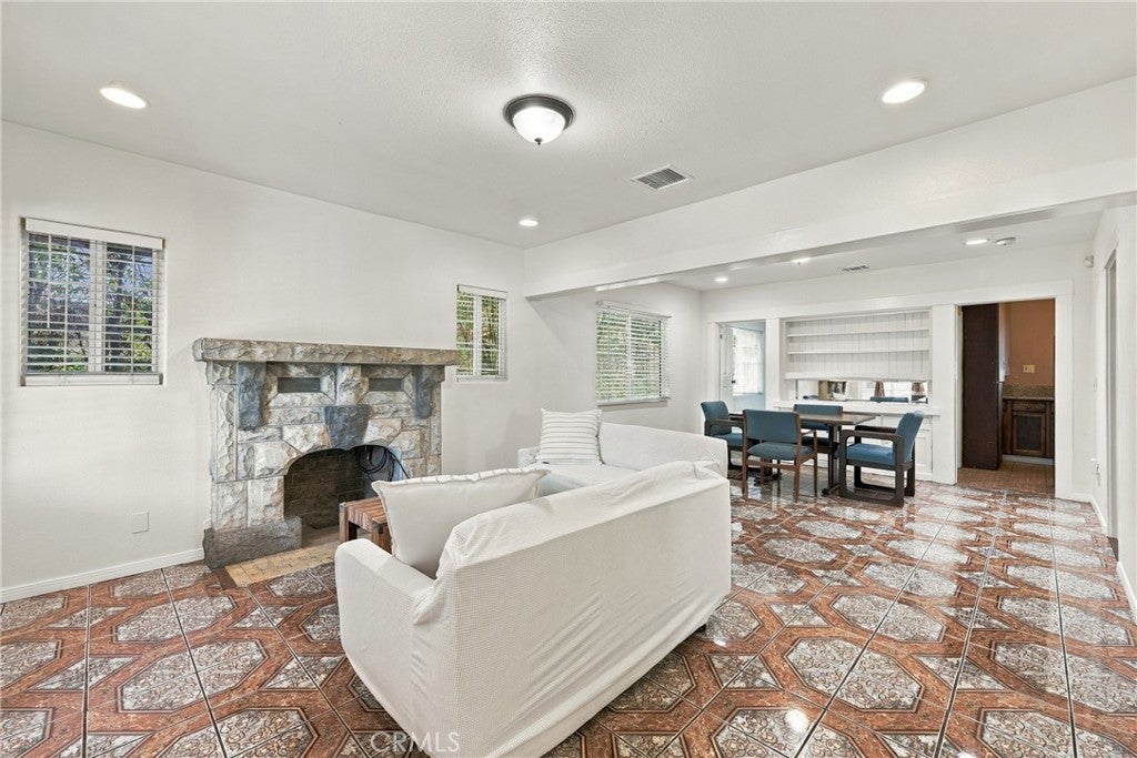 Photo of 1659 W 39th Pl, Los Angeles, CA 90062 (MLS # SB26225311)