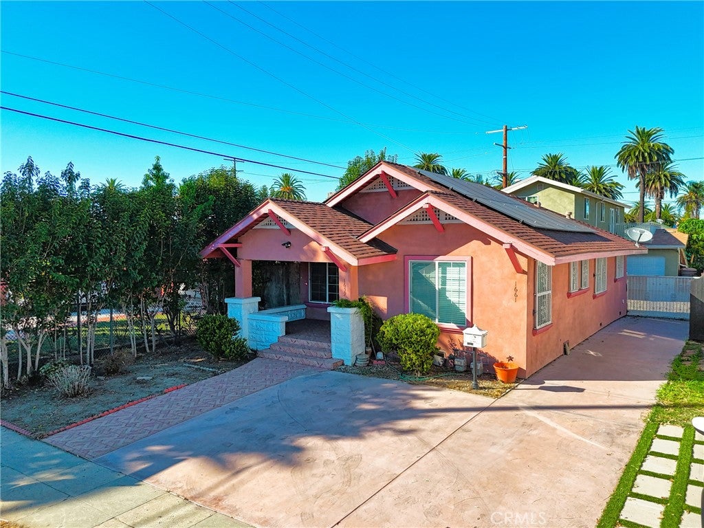 Photo of 1659 W 39th Pl, Los Angeles, CA 90062 (MLS # SB26225311)