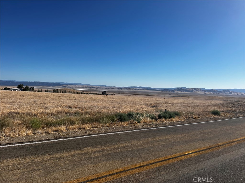 5 PARCELS SOLD TOGETHER FOR A TOTAL OF 12.5 ACRES OF CONTINUOUS LAND! Located just off the 58 and 7 Mile Road in the California Valley. This lot is 2.5 acres of flat, usable land ready for you to make it your own. This parcel is just off of the main 7 Mile Road that connects a lot of the interconnecting roads throughout the valley. You will also notice it is close to active power lines and ready for your utilities. This owner has 8 total parcels that I am listing with 5 of them being right next to each other (Arriba Trl) for the possibility of 12.5 continuous, uninterrupted acreage! (Here are the APNS for all of the parcels I have listed with this owner: 084-011-015, 084-011-016, 084-011-017, 084-011-018, 084-011-019, 084-011-040, 084-021-045, 084-011-013. Many people live out there full-time, or park their trailer for a weekend of hikes and 4x4. Lots of space for your animals too. Take a drive out and see for yourself today!