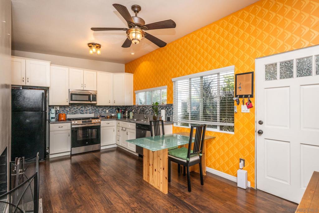 Welcome to this fabulous breezy mid-century modern gem in South Chula Vista—just 15 minutes from Downtown San Diego and minutes from the coast, the new Gaylord Pacific resort, and historic Third Avenue’s thriving shops and restaurants. Built in 1955, this beautifully updated home features laminate wood flooring, fresh paint, and new solar panels—partially paid, with the loan to be paid off through the sale. The open-concept layout connects the kitchen and living room through a stunning dual-sided fireplace, creating the perfect space for entertaining with seamless indoor-outdoor flow. Step outside to a serene backyard perched on a bluff, where garden seating invites you to relax or meditate, a raised vegetable garden is ready for planting, and a charming “he-she” shed offers a cozy creative retreat. Down below, a concrete pad awaits your dream spa or hot tub. Located just 2.4 miles from the nearest trolley station and 2 miles from Chula Vista Mall, this home offers convenience, connection, and lifestyle. You'll also enjoy quick access to Hilltop Park’s off-leash dog park, top-rated schools, the 805 freeway, Chula Vista Harbor, and endless adventures on land or sea. This home is more than a residence—it’s a private sanctuary in one of South Bay’s fastest-rising neighborhoods.