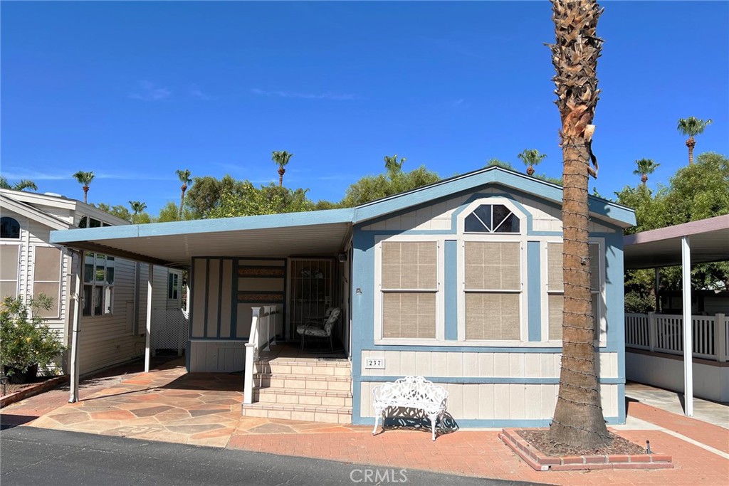 Don't miss this fantastic new opportunity in the highly desirable Desert Shadows RV Resort, a premier 55+ seasonal living community where you own the land! This unit features two bedrooms (including a versatile "California Room") and has been highly upgraded in both form and function! New Quartz Countertops, with full tile backsplash, Stainless Steel Double Sink with New Faucet and Garbage Disposal, New Stainless Steel Refrigerator Included! Stackable Washer Dryer Included! The bathroom has also been remodeled with new flooring and the same Quartz Counters as the kitchen, as well as new fixtures. In the backyard there is a workshop/shed for storage or hobbies. This is one of the finest units in the resort! The HOA fee includes water, cable, trash, and common area maintenance, as well as Cable TV and Internet Service from Spectrum is in included in your HOA payment! Desert Shadows offers an array of amenities, creating a true oasis for its residents. Two large, well-maintained clubhouses, plus three additional satellite clubhouses. Indoor pool with a spacious spa, and olympic-length lap pool, combined a total of six pools, five spas, and three saunas throughout the community. Sunken, Lighted Tennis Courts, eight Pickle-Ball Courts, and an Indoor Shuffleboard Pavilion. A 16,000-square foot Ballroom the "San Jacinto Room" with a floating hardwood dance floor, a professional stage, and a large kitchen, perfect for events and gatherings. Additionally, the 3,000-square foot "Our Gang" party room and lounge features a grand fireplace and kitchen, featuring BINGO during the Winter Season. The clubhouse extends into a huge party terrace with stunning mountain views, a fully equipped fitness center, dance studio, library, billiards room, horseshoe pits, and several convenient laundry, restroom, and bath facilities. An Art Room complete with a pottery kiln, offer spaces for creative pursuits, and there's even a putting green for golf enthusiasts.The community fosters an engaging social atmosphere with organized fitness activities and daily events, including dances, dinners, and entertainment. The location is also incredibly convenient, putting you close to everything you need.This is a must-see property!