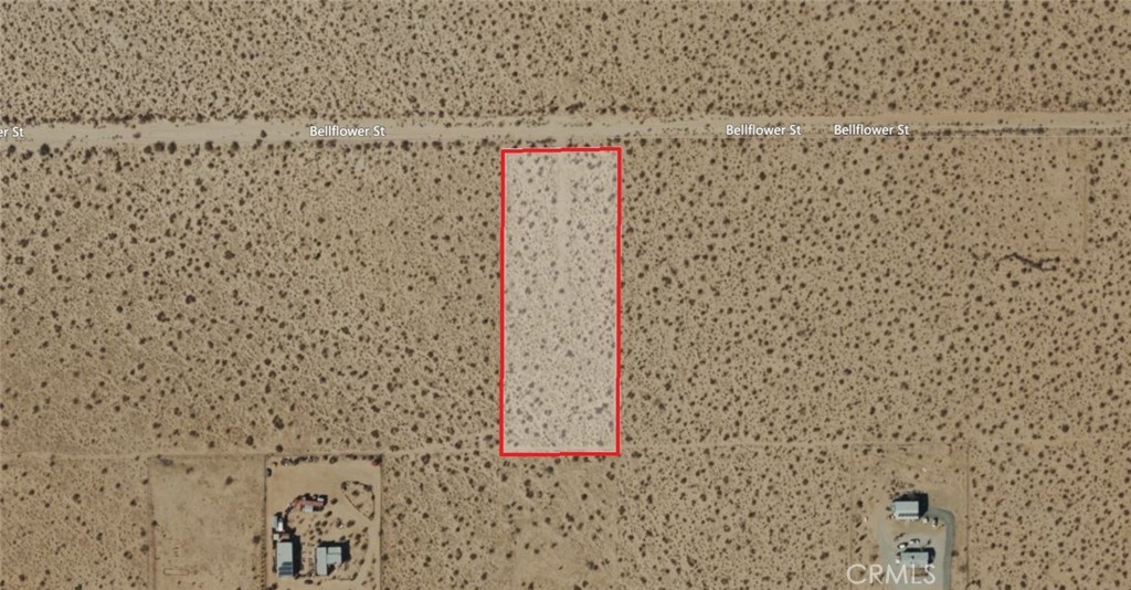 303 Bellflower Road, Joshua Tree (APN: 0605-262-07-0000) offers wide desert skies and boundless horizons. This parcel is a canvas for creativity, inviting visionaries to shape a future surrounded by natural beauty and open space. Address is for MLS input purposes only. County has not assigned an official situs address. Parcel is identified by APN and GPS coordinates. Buyer to verify location, zoning, and utilities.