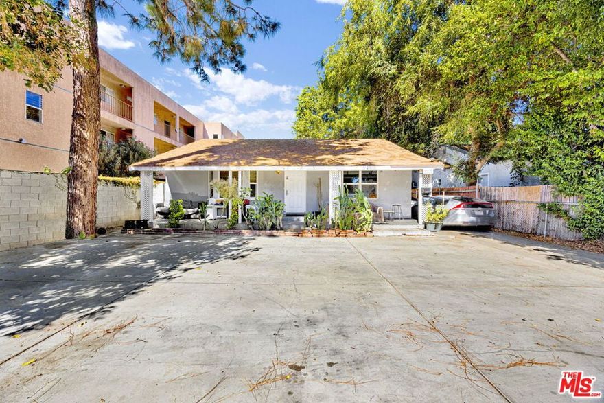 Exceptional Investment Opportunity with LAR3 zoning! This fabulous detached multi-residential duplex is truly an investor's dream, offering the exciting potential to build more units (buyer to verify). The front unit -14541 Hart - is thoughtfully set back from the street and comes with the convenience of four front parking spaces. This unit features 2 bedrooms and 2 baths, and has some updates including central AC. The kitchen has granite counters and ample cabinetry. The detached back unit - 14539 Hart - offers 1 bedroom and 1 bath, complete with window AC units for those warm summer days. Two rear parking spaces are included for added convenience. Nestled between these units is a 120 square foot storage shed, providing extra space for your storage needs. Moreover, the property features a detached garage with ready, approved, and paid plans for conversion, offering the potential to be transformed into an additional unit, which could bring in extra income. A large yard space behind the garage unit enhances the property's outdoor appeal. This amazing investment could be a valuable addition to your real estate portfolio, or serve as a home with additional income to offset the mortgage payment. The location is prime, providing easy access to shopping, public transportation, local freeways, and more! Whether you are looking to offset your mortgage or build a multi-unit property, this can be your perfect opportunity!