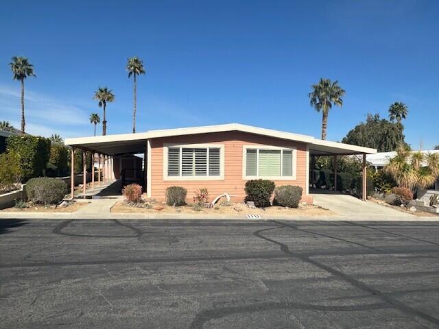 A fantastic opportunity for the right person! Needs some TLC and this will be a showstopper! The home was remodeled over time and has all the basics done for you- it is fully drywalled w/ finished ceilings, double paned windows & sliders, plantation shutters, recessed lighting, track lighting, designer fans a finished master closet and remodeled baths! What it needs: Needs kitchen repairs because of water damage to the floors & cabinetry. Needs new flooring (old carpet) and electrical work (some lights not working) Large Spacious rooms! Being sold AS IS- at a great price so you can do the remodeling needed! Privately owned park. Rent controlled, leased land. Not Indian Land. Subletting allowed after 1 year of residency. HOA is a Social Club and only 75 yearly if you want to join.